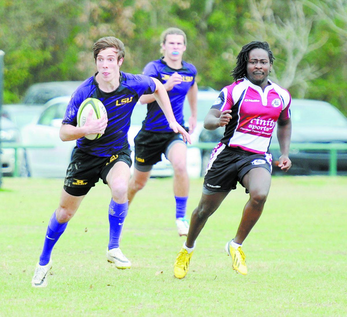 LSU fly half Daniel Dowd (10) runs downfield Saturday, Feb. 22, 2014 during the Tigers' 75-5 win against Mississippi State at Highland Road Community Park.