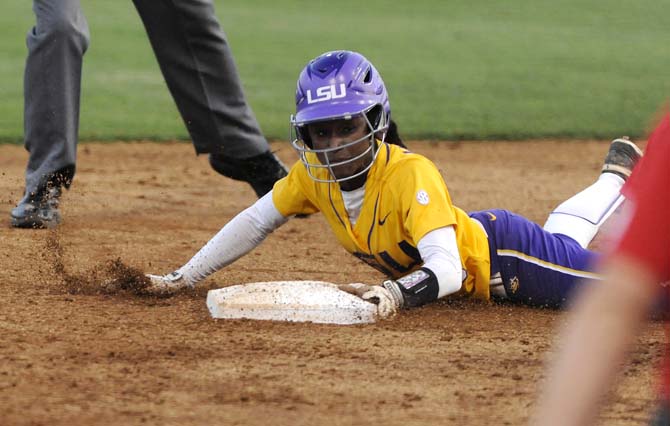 LSU junior outfielder A.J. Andrews (6) slides into second base Wednesday, April 23, 2014 during the Lady Tigers' 6-1 victory against the University of South Alabama at Tiger Park.