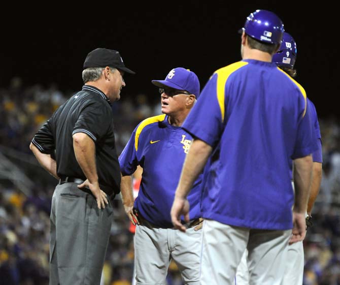 LSU head coach Paul Mainieri argues with an umpire about a questionable call Saturday, May 31, 2014 during the Tigers' 5-1 victory against Houston in Alex Box Stadium.