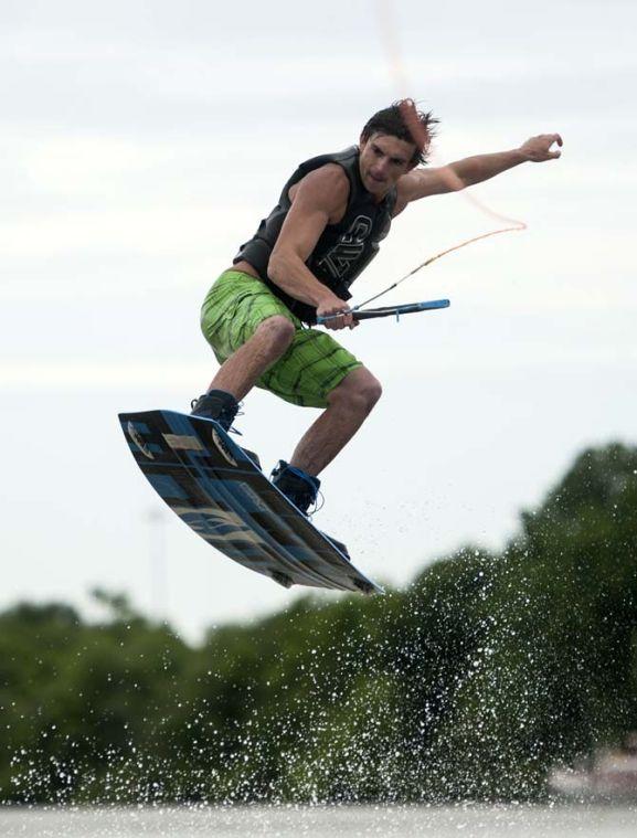 LSU wakeboarder Kyle Jordan does a trick Wednesday, April 30, 2014, in the Gulf Intracoastal Waterway.