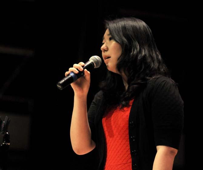 A singer performs during the Asian American Cultural Heritage Showcase Friday, March 28, 2014, in the Cotillion Ballroom inside the LSU Student Union.