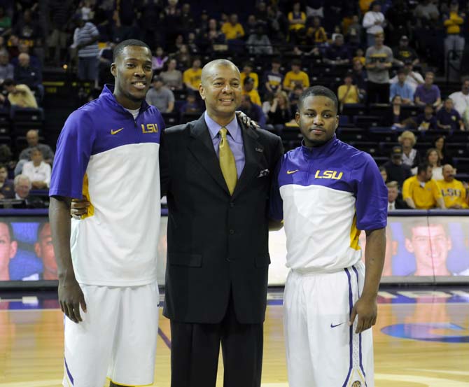 LSU head basketball coach Johnny Jones (center) poses with seniors Andre Stringer (right) and Shavon Coleman (left) on Saturday, March 8, 2014 before LSU's 61-69 loss to Georgia in the PMAC.