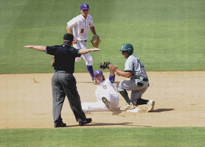 LSU junior infielder Conner Hale (20) looks to the umpire for his verdict Friday, May 30, 2014 during the Tigers' 8-4 victory against Southeastern Louisiana in Alex Box Stadium.