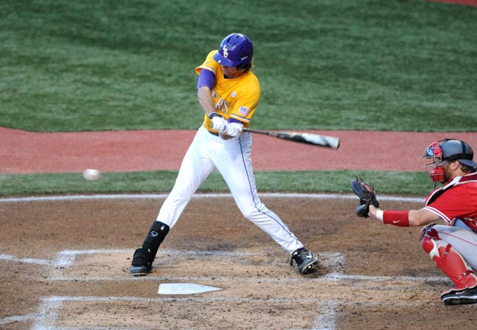 LSU sophomore outfielder Mark Laird (9) swings at the ball Sunday, June 1, 2014 during the Tigers' 5-4 loss to Houston in Alex Box Stadium.