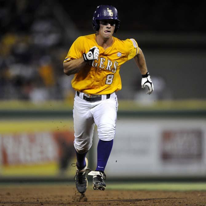 LSU sophomore infielder Alex Bregman (8) runs towards third base Sunday, April 1, 2014 during the Tigers' 5-4 loss against Houston in Alex Box Stadium.