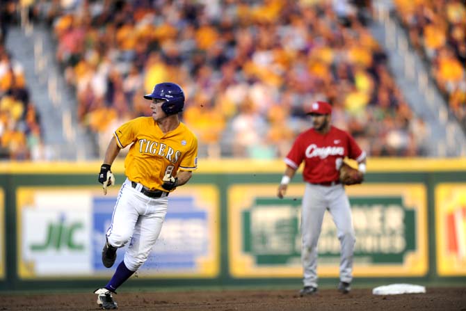 LSU sophomore infielder Alex Bregman (8) rounds second base Sunday, April 1, 2014 during the Tigers' 5-4 loss against Houston in Alex Box Stadium.