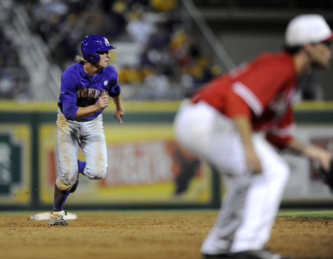 LSU sophomore outfielder Andrew Stevenson (6) runs towards third base Saturday, May 31, 2014 during the Tigers' 5-1 victory against Houston in Alex Box Stadium.