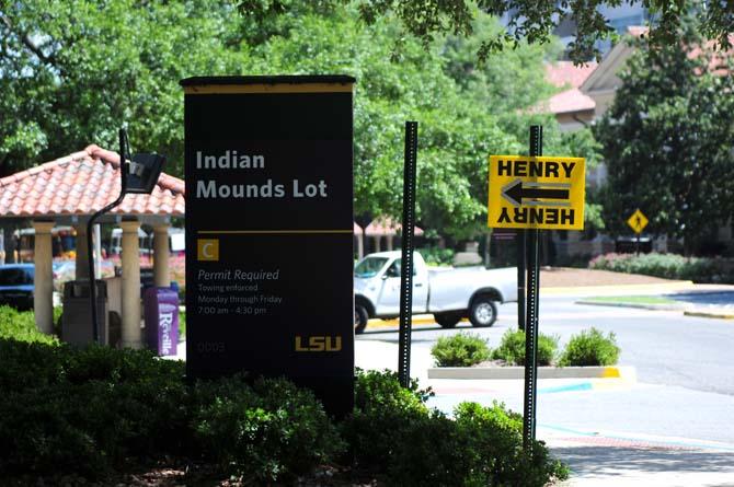 A sign reading "Henry" is posted near the Indian Mounds Lot Wednesday, June 18, 2014 on campus.