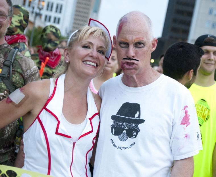 Race participants wait at the starting line Saturday, June 28, 2014 before the post-apocalypse themed 5k race "Escape from Baton Rouge" near the Capitol building downtown.