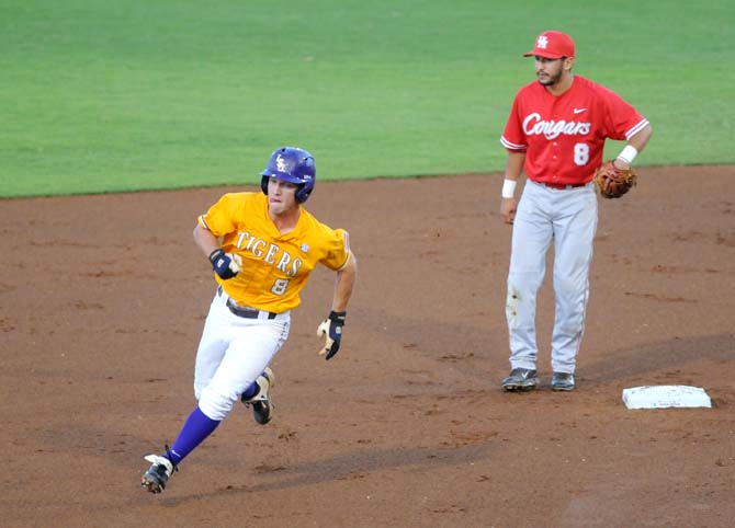 LSU sophomore infielder Alex Bregman (8) rounds second base Sunday, June 1, 2014 during the Tigers' 5-4 loss against Houston in Alex Box Stadium.