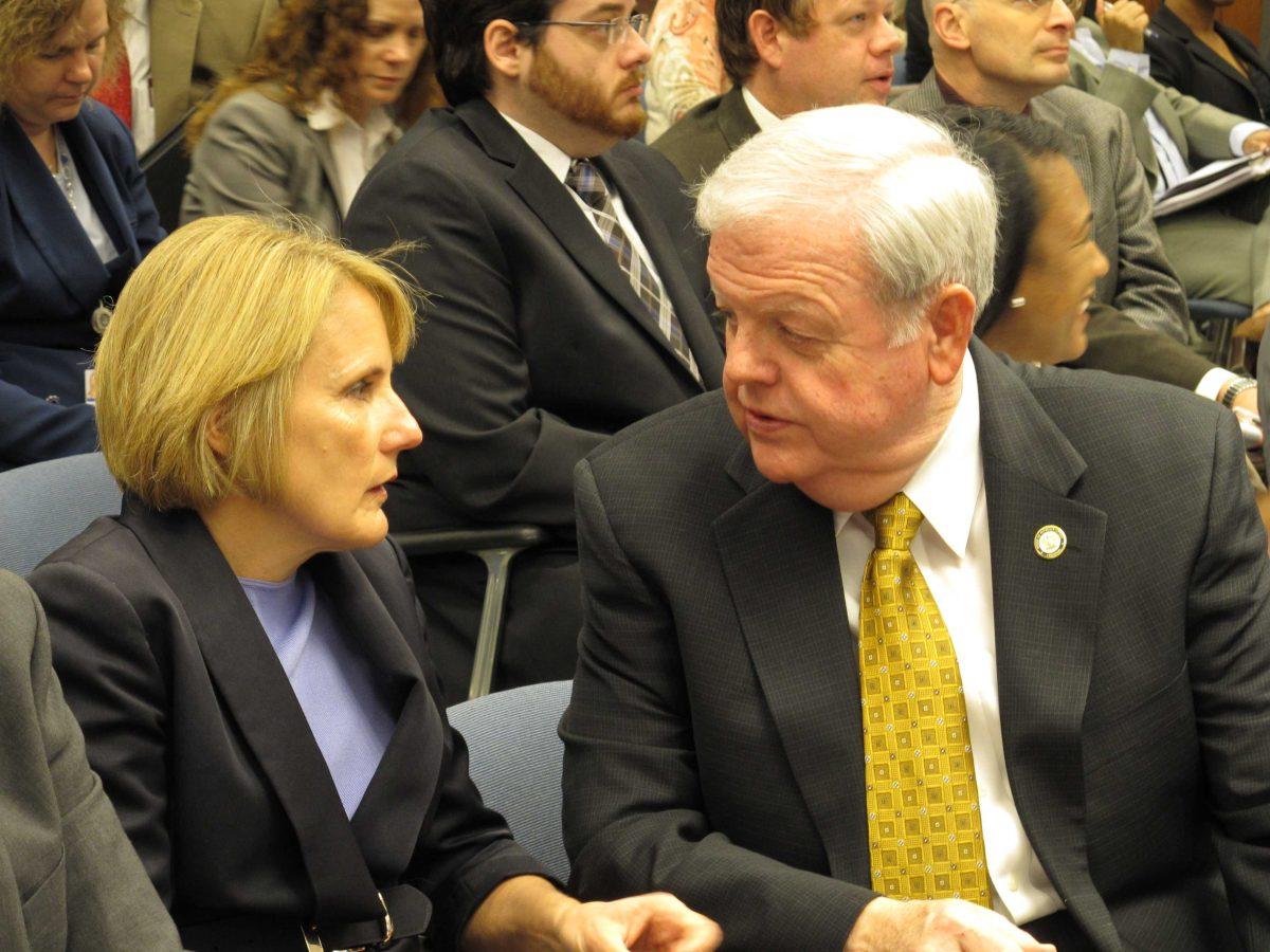 Department of Health and Hospitals Secretary Kathy Kliebert, left, speaks to Rep. Bubba Chaney, R-Rayville, before her budget presentation on Tuesday, April 1, 2014, in Baton Rouge, La. The House Appropriations Committee raised concerns about Gov. Bobby Jindal's budget proposal for the health department next year. (AP Photo/Melinda Deslatte)