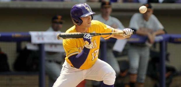 LSU junior outfielder Jared Foster (17) prepares to bunt the ball Sunday, April 27, 2014, during the Tigers' 9-4 victory against Tennessee in Alex Box Stadium.