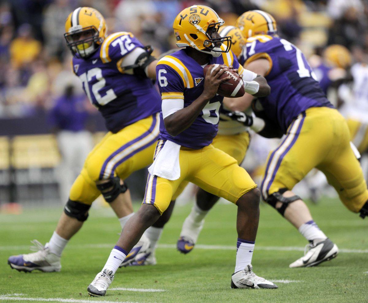 LSU freshman quarterback Brandon Harris (6) looks to make a pass Saturday, April 5, 2014 during the white squad's 42-14 victory against the purple squad in the National L Club Spring Game in Tiger Stadium.