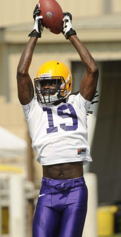 LSU senior wide receiver Quantavius Leslie (19) catches the ball Monday, August 4, 2014 during Fall Camp.