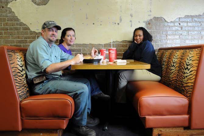 Cane's customers enjoying a meal Thursday August 21, 2014.