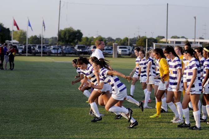 LSU soccer team warms up on Friday, August 22, 2014 during the Tigers' 2-0 victory against Troy in LSU Soccer Stadium.