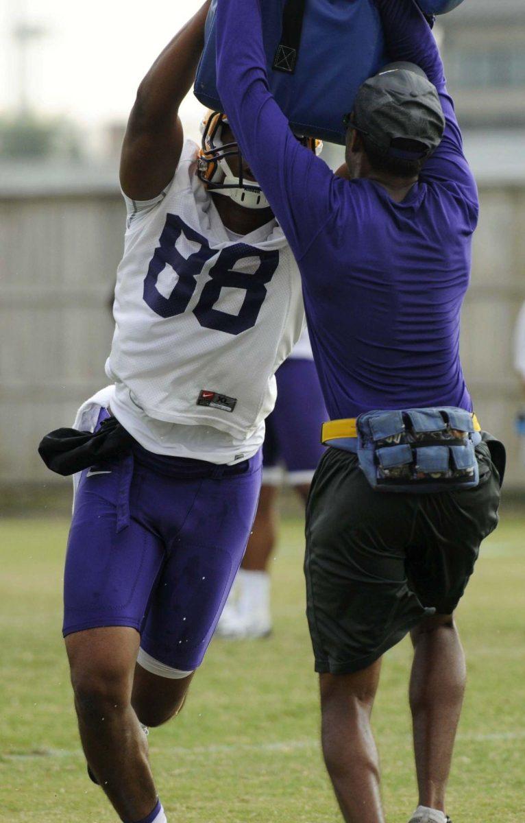 LSU freshman tight end Jacory Washington (88) practices tackling Tuesday, August 5, 2014 at the Charles McClendon Practice Facility.