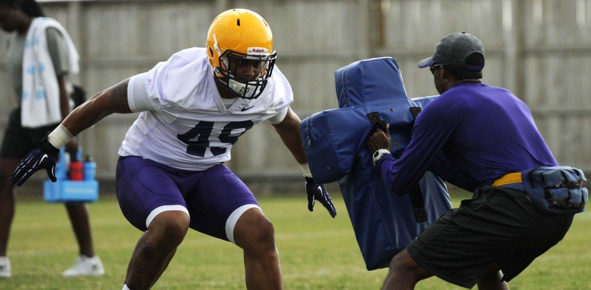 LSU sophomore fullback Melvin Jones (49) practicing his tackling Tuesday, August 5, 2014 at the Charles McClendon Practice Facility.