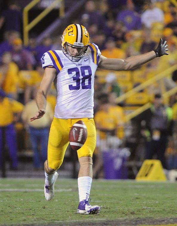 LSU sophomore punter Jamie Keehn (38) punts the ball Saturday, September 21, 2013, during the Tigers' 35-21 victory against Auburn in Tiger Stadium.