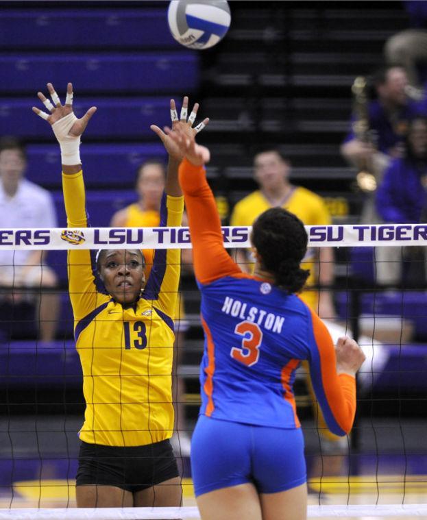 LSU freshman Briana Holman (13) attempts to block Florida freshman setter Alex Holston (3) Friday, Nov. 1, 2013 during the Tiger's 3-1 loss to the Florida Gators in the PMAC.