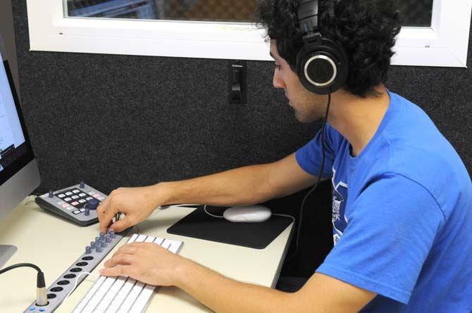 Chemical Engineering senior and rapper Kareem Awad plays one of his tracks in Studio 151 before his opening at LSU's back-to-school concert on Tuesday, August 26, 2014 at the Parade Grounds.