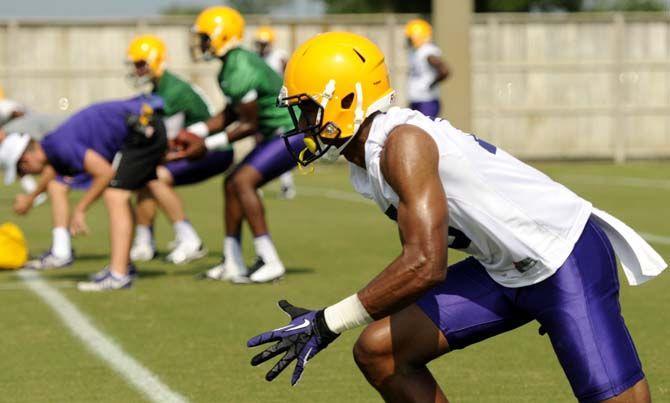 LSU freshman wide receiver Malachi Dupre (15) gets ready to execute a drill Tuesday, August 5, 2014 during Fall Camp in the Charles McClendon Practice Facility.