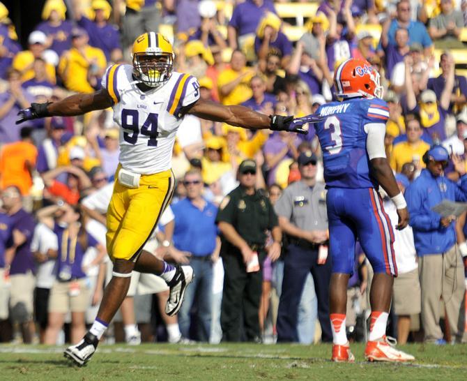 LSU sophomore defensive end Danielle Hunter (94) celebrates after blocking a pass Saturday, Oct. 12, 2013 during the Tigers' 17-6 victory against the Gators in Tiger Stadium.