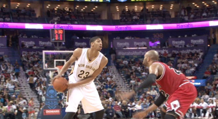 Anthony Davis faces up Chicago's Taj Gibson