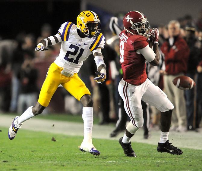 LSU freshman defensive back Rashard Robinson (21) breaks up a pass Saturday, Nov. 9, 2013 during the Tiger's 38-17 loss to the Alabama Crimson Tide at Bryant-Denny Stadium in Tuscaloosa, AL.