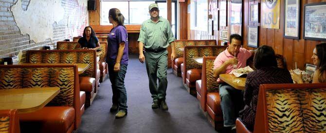 Customer and local Joey Lemoine entering Cane's for a delicious combo meal.