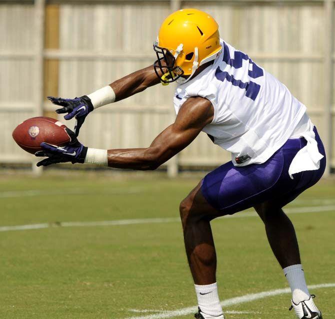 LSU freshman wide receiver Malachi Dupre (15) catches the ball Tuesday, August 5, 2014 during a drill in the Charles McClendon Practice Facility.