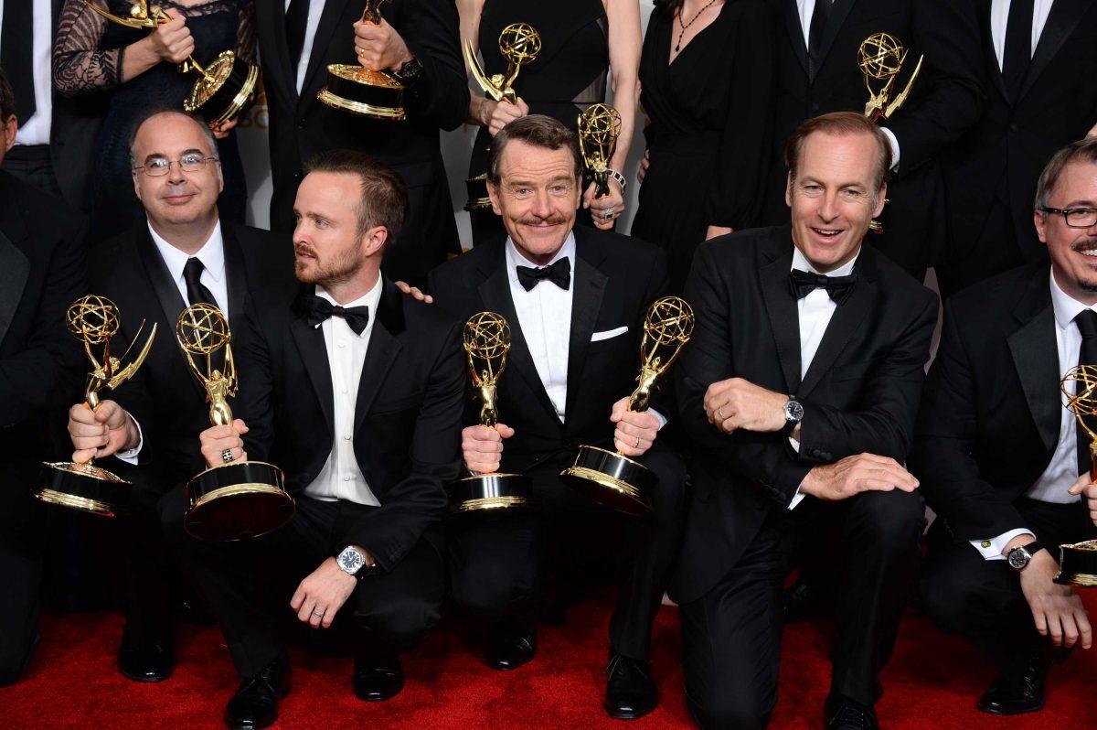 Co-executive producer Thomas Schnauz, from left Aaron Paul, Bryan Cranston and Bob Odenkirk pose in the press room with the award for outstanding drama series for "Breaking Bad" at the 66th Annual Primetime Emmy Awards at the Nokia Theatre L.A. Live on Monday, Aug. 25, 2014, in Los Angeles. (Photo by Jordan Strauss/Invision/AP)