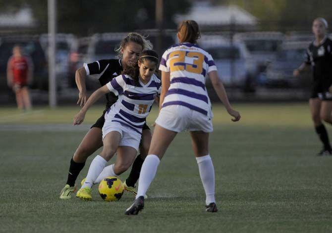 LSU Junior midfielder Natalia Gomez-Junco (11) dribbles the ball Friday, August 22, 2014 during the Tigers' 2-0 victory against Troy in LSU Soccer Stadium.