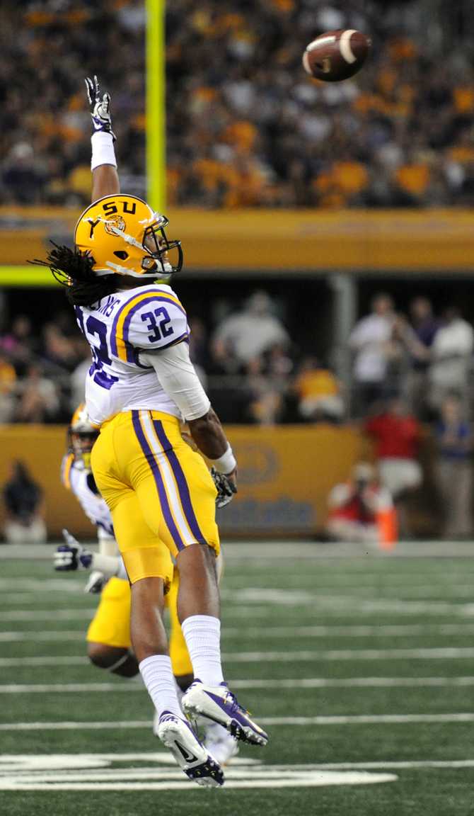 LSU sophomore Jalen Collins (32) blocks a pass Aug. 31, 2013 before the 37-27 victory against TCU in the Cowboys Classic at AT&amp;T Stadium in Arlington, Texas.