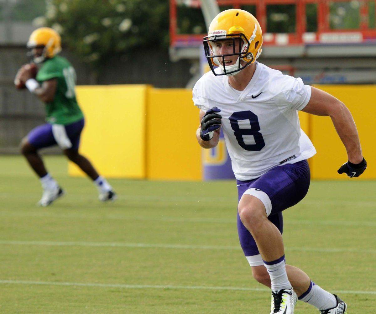 LSU freshman wide receiver Trey Quinn (8) sprints to catch the ball Tuesday, August 5, 2014 during a drill at Charles McClendon Practice Facility.