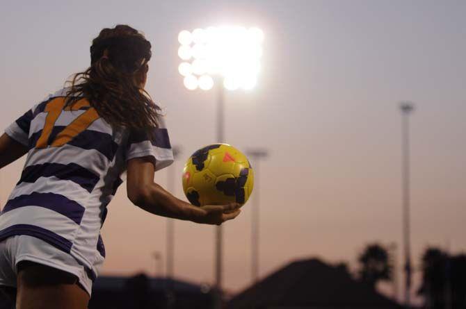 LSU freshman defender Alexis Urch (17) gets ready to trhow-in the football on Friday, August 22, 2014 during the Tigers' 2-0 victory against Troy in LSU Soccer Stadium.