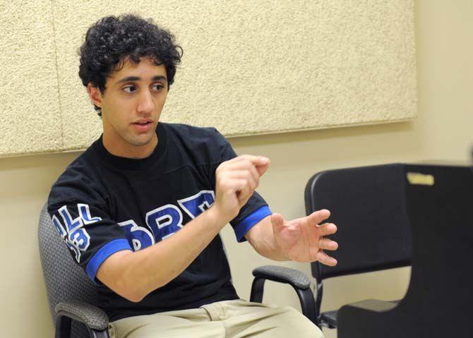 Student and rapper Kareem Awad talks about his process of making music on Friday, August 22, 2014.