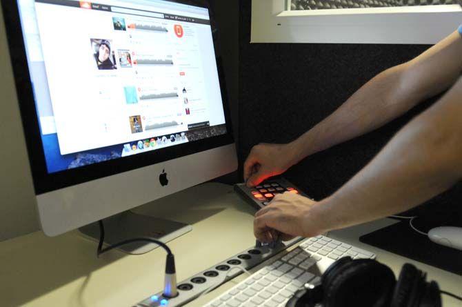 Chemical Engineering senior and rapper Kareem Awad plays one of his tracks in Studio 151 before his opening at LSU's back-to-school concert on Tuesday, August 26, 2014 at the Parade Grounds.