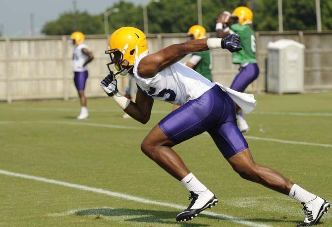 LSU freshman wide receiver Malachi Dupre (15) runs to catch the ball Tuesday, August 5, 2014 during a drill in the Charles McClendon Practice Facility.
