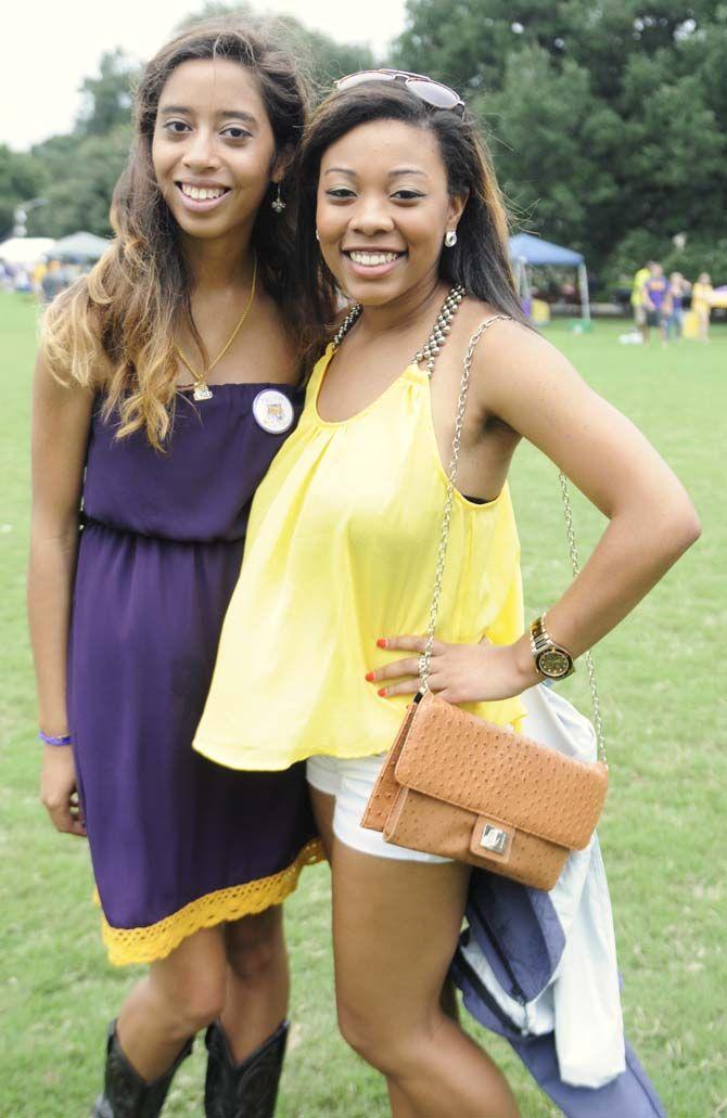 Mass communication freshmen Kia Sims and Mayumi Dickerson pose in their gameday outfits Saturday, September 13, 2014 before the LSU vs ULM football game in Tiger Stadium.