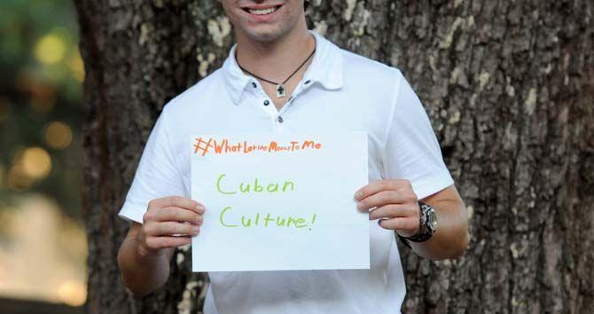 The Hispanic Student Cultural Society make signs about what being Latino means to them.