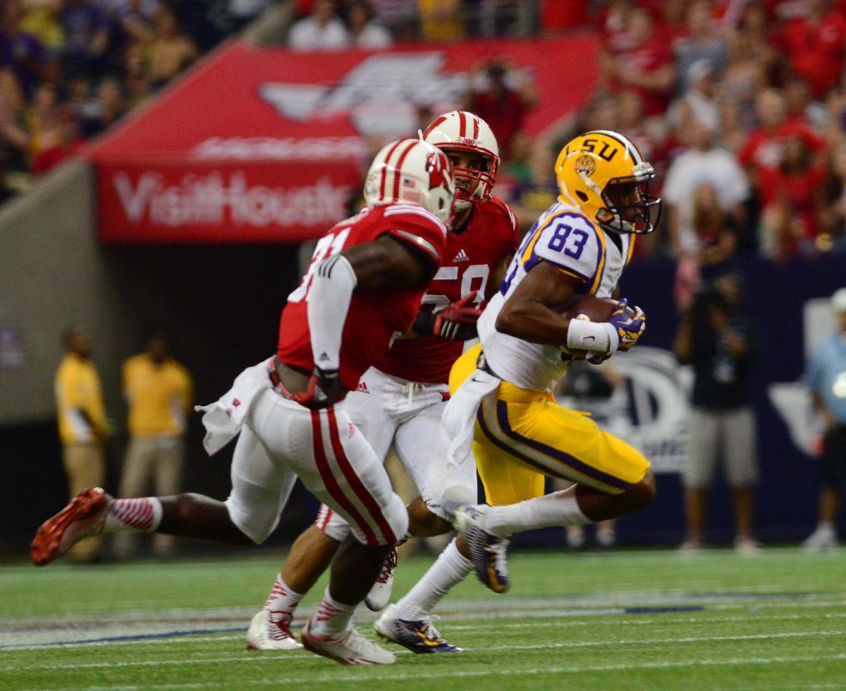 LSU football player Travin Dural with the ball Saturday night August 30, 2014.