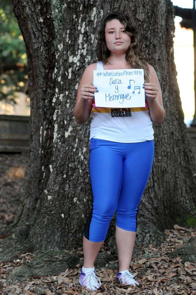 The Hispanic Student Cultural Society make signs about what being Latino means to them.