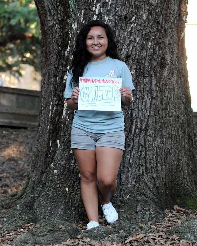 The Hispanic Student Cultural Society make signs about what being Latino means to them.