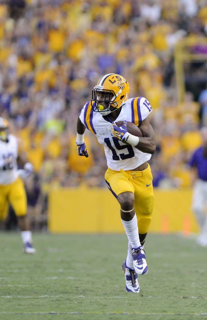 Wide receiver Malachi Dupre (15) runs the ball down the field Saturday, September 20, 2014 in Tiger Stadium on Tigers' defeat against Mississippi State 34-29.