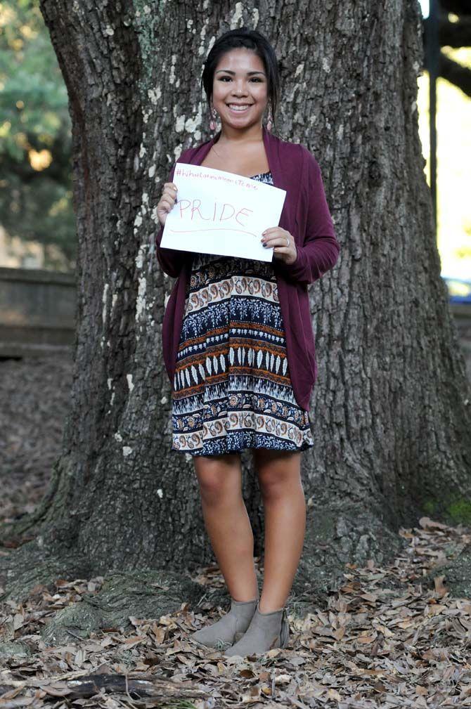 The Hispanic Student Cultural Society make signs about what being Latino means to them.