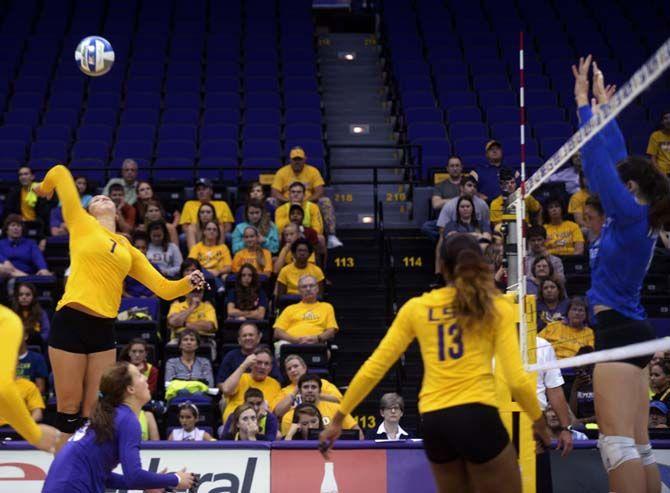 LSU volleyball junior Outside Hitter Katie Lindelow (7) jumps to spike the ball during the loss aginst Kentucky Wednesday, September 24, 2014 in the PMAC.