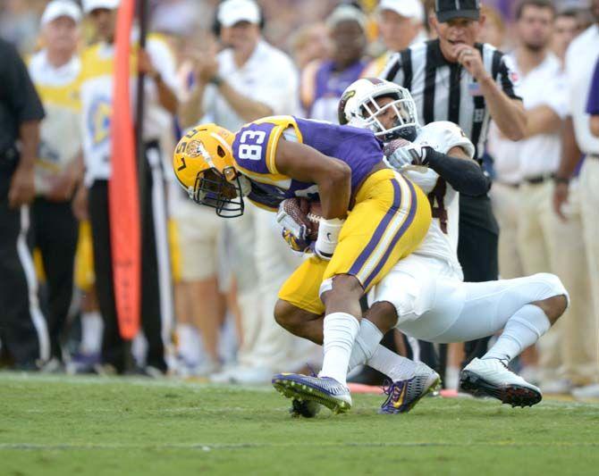 LSU sophomore wide receiver Travin Dural (83) holds onto the football Saturday, Sep. 13, 2014 during the Tigers' 31-0 victory against the Warhawks in Tiger Stadium.