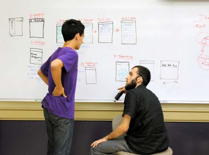 GeauxHack participants work together on a porject for LSU's first hackathon.