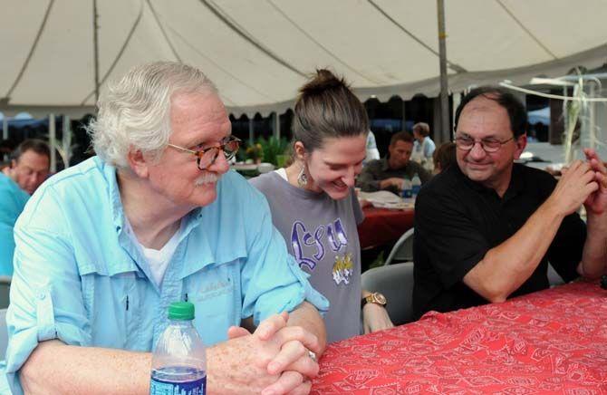 Louisiana Photo Society members (left to right) Ken Wilson, Stephanie Ross, and David Arbour sit during a club fieldtrip at the LSU Rural Life Museum Sunday, September 26, 2014.